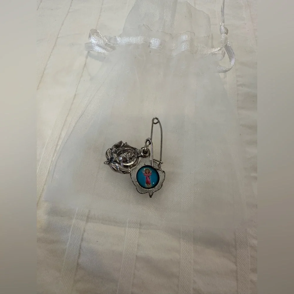 Vintage religious safety pin brooch guardian angel or the Divine Child Jesus.